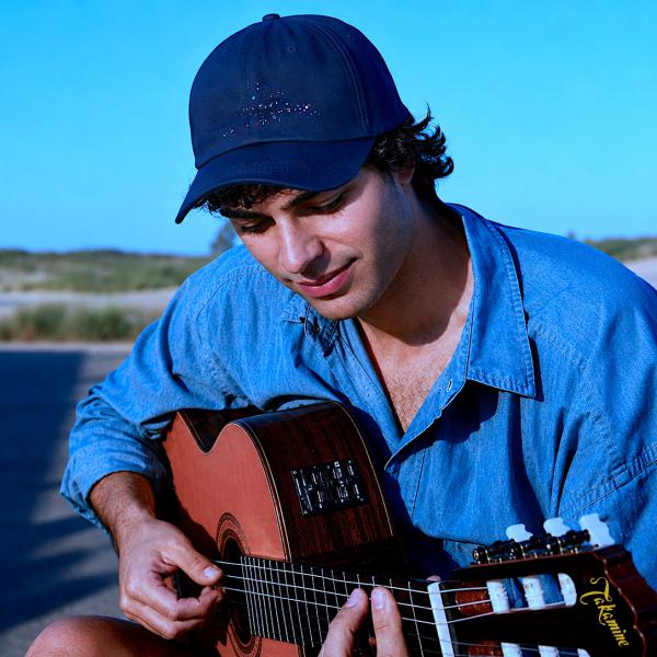 Andés playing at the beach